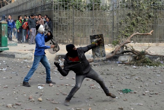 Fighters use small, improvised shields, Cairo, Jan 25, 2013.