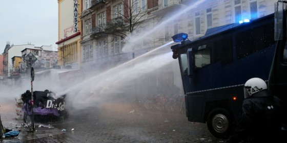 Police water cannon attacks protest, Dec 21, 2013.
